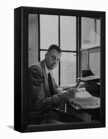 Harvard University Professor John Kenneth Galbraith Sitting in a Harvard Library-Dmitri Kessel-Framed Premier Image Canvas