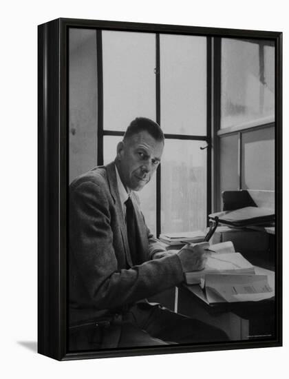 Harvard University Professor John Kenneth Galbraith Sitting in a Harvard Library-Dmitri Kessel-Framed Premier Image Canvas