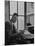 Harvard University Professor John Kenneth Galbraith Sitting in a Harvard Library-Dmitri Kessel-Mounted Premium Photographic Print