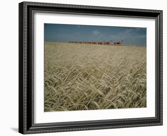 Harvest Story: Combines Harvest Wheat at Ranch in Texas-Ralph Crane-Framed Photographic Print