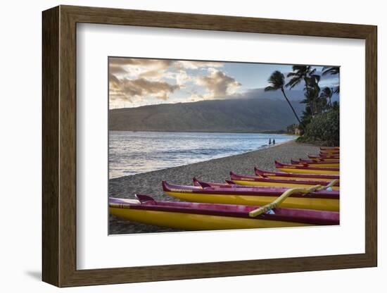 Hawaii, Maui, Kihei. Outrigger canoes on Kalae Pohaku beach and palm trees.-Janis Miglavs-Framed Photographic Print