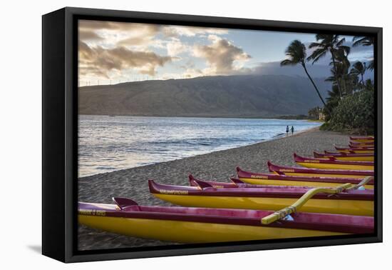 Hawaii, Maui, Kihei. Outrigger canoes on Kalae Pohaku beach and palm trees.-Janis Miglavs-Framed Premier Image Canvas