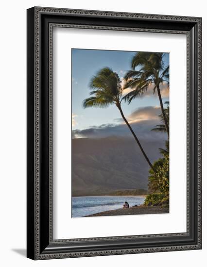 Hawaii, Maui, Kihei. Tourists walking under palm trees on Kalae Pohaku beach.-Janis Miglavs-Framed Photographic Print