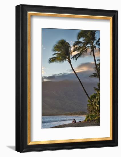 Hawaii, Maui, Kihei. Tourists walking under palm trees on Kalae Pohaku beach.-Janis Miglavs-Framed Photographic Print