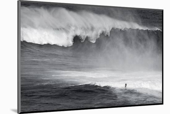 Hawaii, Maui. Lone Figure Surfing Monster Waves at Pe'Ahi Jaws, North Shore Maui-Janis Miglavs-Mounted Photographic Print