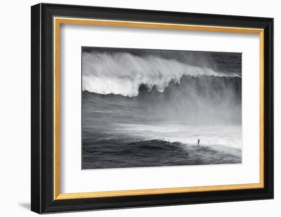 Hawaii, Maui. Lone Figure Surfing Monster Waves at Pe'Ahi Jaws, North Shore Maui-Janis Miglavs-Framed Photographic Print