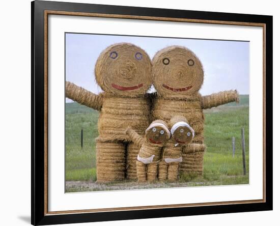 Hay Art - a Family Constructed Out of Hay Bales Along a North Dakota Road-null-Framed Photographic Print