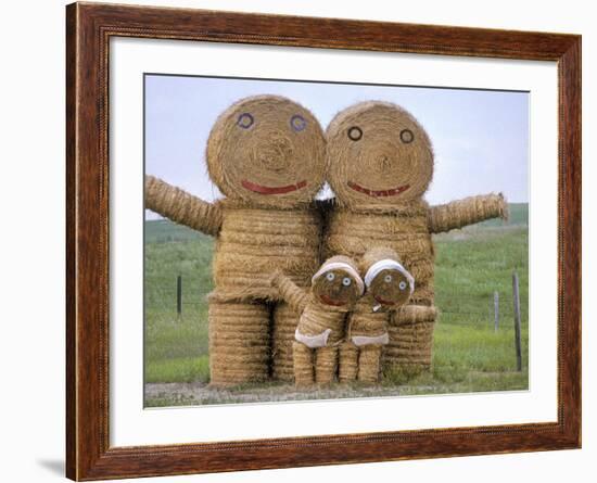 Hay Art - a Family Constructed Out of Hay Bales Along a North Dakota Road-null-Framed Photographic Print