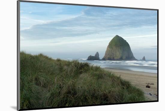 Hay Stack Rock on the sandy beach at Cannon Beach, Oregon-Greg Probst-Mounted Photographic Print