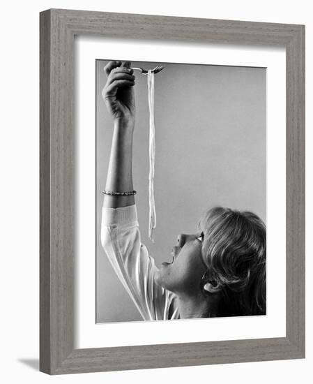 Hayley Mills Attempting to Eat Spaghetti-Ralph Crane-Framed Photographic Print