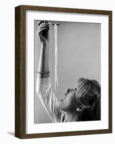 Hayley Mills Attempting to Eat Spaghetti-Ralph Crane-Framed Photographic Print