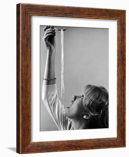 Hayley Mills Attempting to Eat Spaghetti-Ralph Crane-Framed Photographic Print