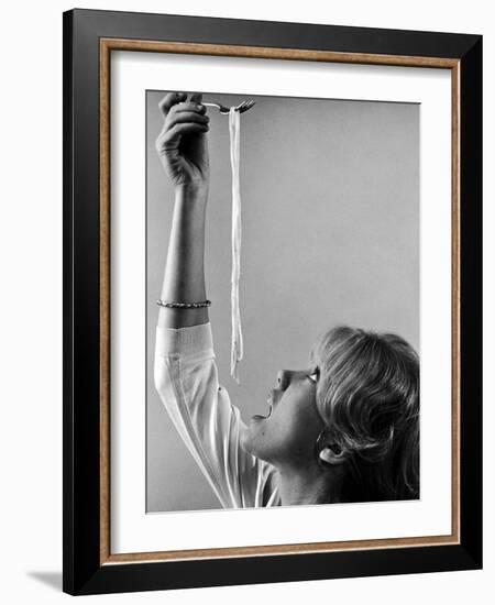 Hayley Mills Attempting to Eat Spaghetti-Ralph Crane-Framed Photographic Print