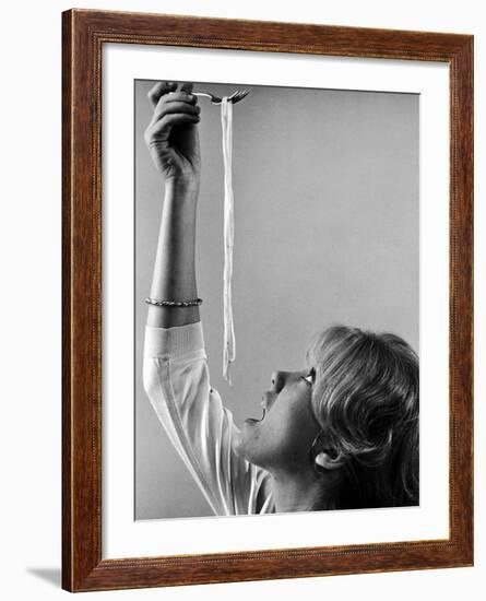 Hayley Mills Attempting to Eat Spaghetti-Ralph Crane-Framed Photographic Print