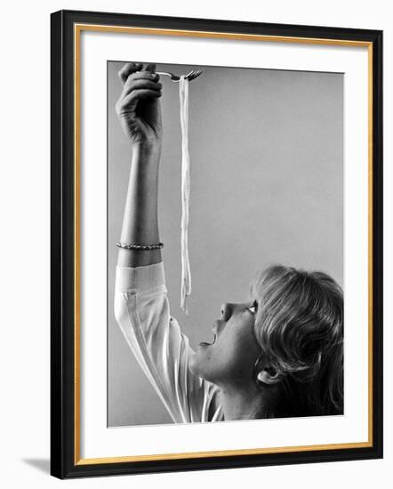 Hayley Mills Attempting to Eat Spaghetti-Ralph Crane-Framed Photographic Print