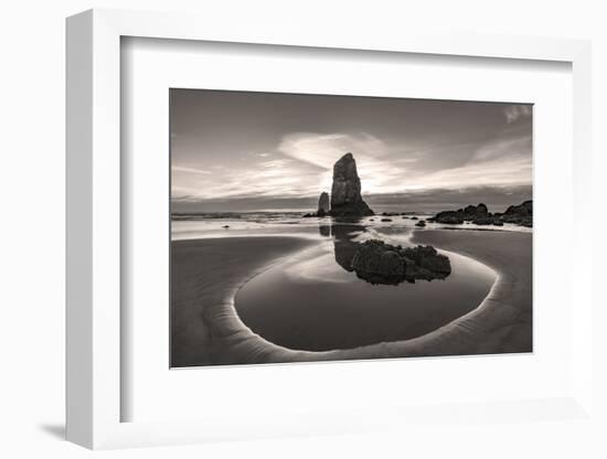 Haystack Rock Pinnacles at low tide in Cannon Beach, Oregon, USA-Chuck Haney-Framed Photographic Print