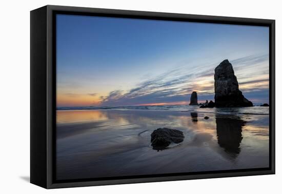 Haystack Rock Pinnacles at low tide in Cannon Beach, Oregon, USA-Chuck Haney-Framed Premier Image Canvas