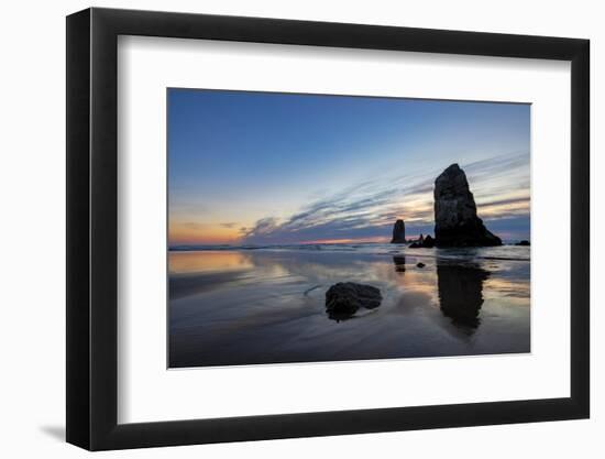 Haystack Rock Pinnacles at low tide in Cannon Beach, Oregon, USA-Chuck Haney-Framed Photographic Print