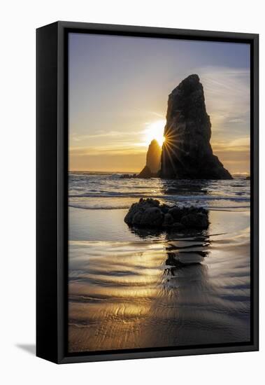 Haystack Rock Pinnacles at low tide in Cannon Beach, Oregon, USA-Chuck Haney-Framed Premier Image Canvas