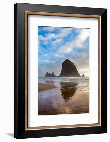 Haystack Rock reflected on the shoreline at Cannon Beach on the Pacific Northwest coast, Oregon, Un-Martin Child-Framed Photographic Print