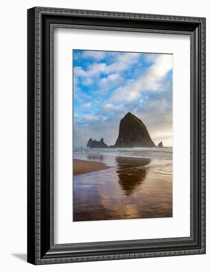 Haystack Rock reflected on the shoreline at Cannon Beach on the Pacific Northwest coast, Oregon, Un-Martin Child-Framed Photographic Print