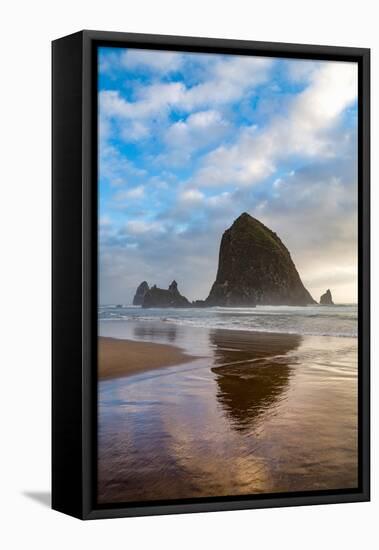 Haystack Rock reflected on the shoreline at Cannon Beach on the Pacific Northwest coast, Oregon, Un-Martin Child-Framed Premier Image Canvas