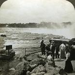 Women Washing Clothes at the Public Fountain in Midwinter, Zuoz, Switzerland-HC White-Photographic Print