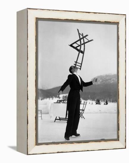 Head Waiter Rene Breguet Balancing Chair on Chin at Ice Rink of Grand Hotel-Alfred Eisenstaedt-Framed Premier Image Canvas