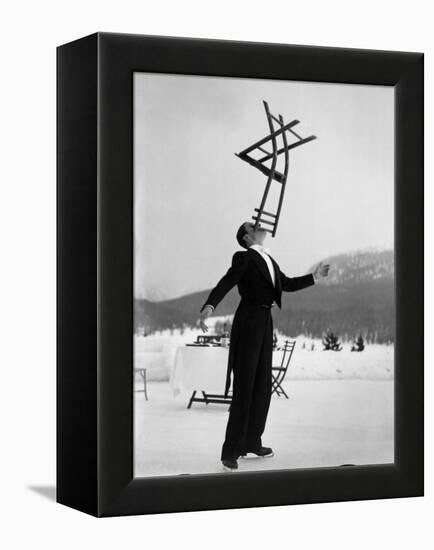 Head Waiter Rene Breguet Balancing Chair on Chin at Ice Rink of Grand Hotel-Alfred Eisenstaedt-Framed Premier Image Canvas