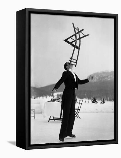 Head Waiter Rene Breguet Balancing Chair on Chin at Ice Rink of Grand Hotel-Alfred Eisenstaedt-Framed Premier Image Canvas