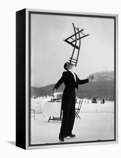 Head Waiter Rene Breguet Balancing Chair on Chin at Ice Rink of Grand Hotel-Alfred Eisenstaedt-Framed Premier Image Canvas
