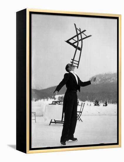 Head Waiter Rene Breguet Balancing Chair on Chin at Ice Rink of Grand Hotel-Alfred Eisenstaedt-Framed Premier Image Canvas