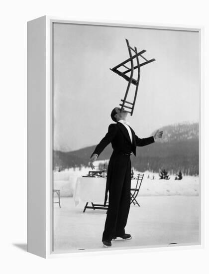 Head Waiter Rene Breguet Balancing Chair on Chin at Ice Rink of Grand Hotel-Alfred Eisenstaedt-Framed Premier Image Canvas