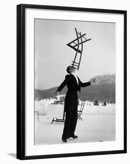 Head Waiter Rene Breguet Balancing Chair on Chin at Ice Rink of Grand Hotel-Alfred Eisenstaedt-Framed Premium Photographic Print