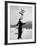 Head Waiter Rene Breguet Balancing Chair on Chin at Ice Rink of Grand Hotel-Alfred Eisenstaedt-Framed Photographic Print