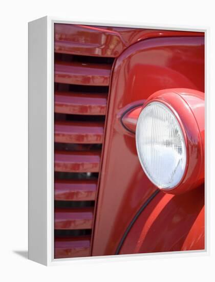Headlight and Partial Grill of a Red Antique Truck-Kathleen Clemons-Framed Premier Image Canvas