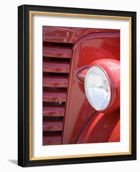 Headlight and Partial Grill of a Red Antique Truck-Kathleen Clemons-Framed Photographic Print