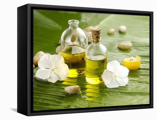 Health Spa with Massage Oil and White Flower ,Candle on Leaf-crystalfoto-Framed Premier Image Canvas