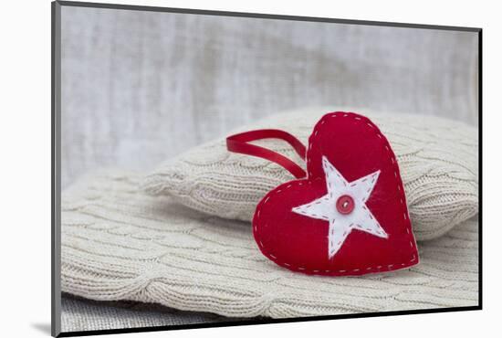 Heart cushions with star of Bethlehem as a token of love, still life-Andrea Haase-Mounted Photographic Print
