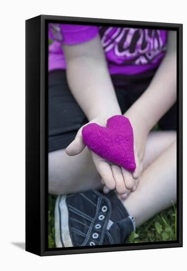 Heart in Child's Hand, Pink, Felt-Andrea Haase-Framed Premier Image Canvas