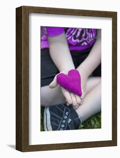 Heart in Child's Hand, Pink, Felt-Andrea Haase-Framed Photographic Print