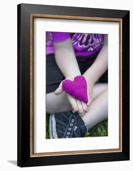 Heart in Child's Hand, Pink, Felt-Andrea Haase-Framed Photographic Print