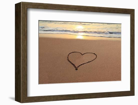 Heart in the Sand on the Beach at Sunset.-Hannamariah-Framed Photographic Print
