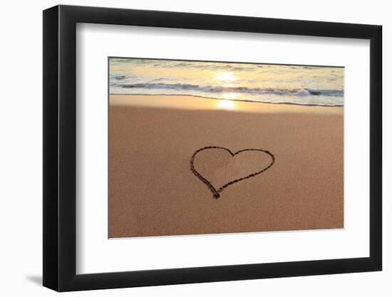 Heart in the Sand on the Beach at Sunset.-Hannamariah-Framed Photographic Print