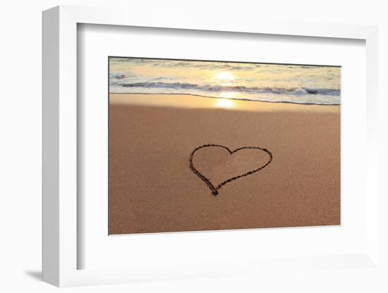 Heart in the Sand on the Beach at Sunset.-Hannamariah-Framed Photographic Print