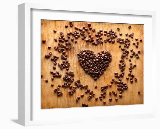 Heart Shape From Brown Coffee Beans, Close-Up On Old Vintage Wooden Background-ouh_desire-Framed Art Print