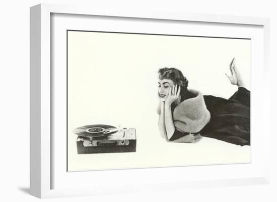 Heavily Browed Lady Listening to Record Player-null-Framed Premium Giclee Print