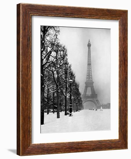 Heavy Snow Blankets the Ground Near the Eiffel Tower-Dmitri Kessel-Framed Photographic Print