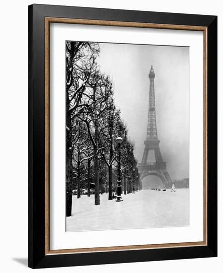 Heavy Snow Blankets the Ground Near the Eiffel Tower-Dmitri Kessel-Framed Photographic Print