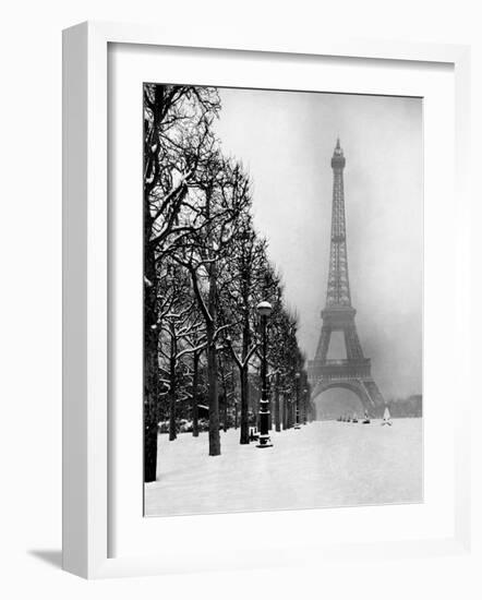 Heavy Snow Blankets the Ground Near the Eiffel Tower-Dmitri Kessel-Framed Photographic Print